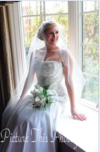 Chapel veil done in the mantilla veil shape is a light transparent accent